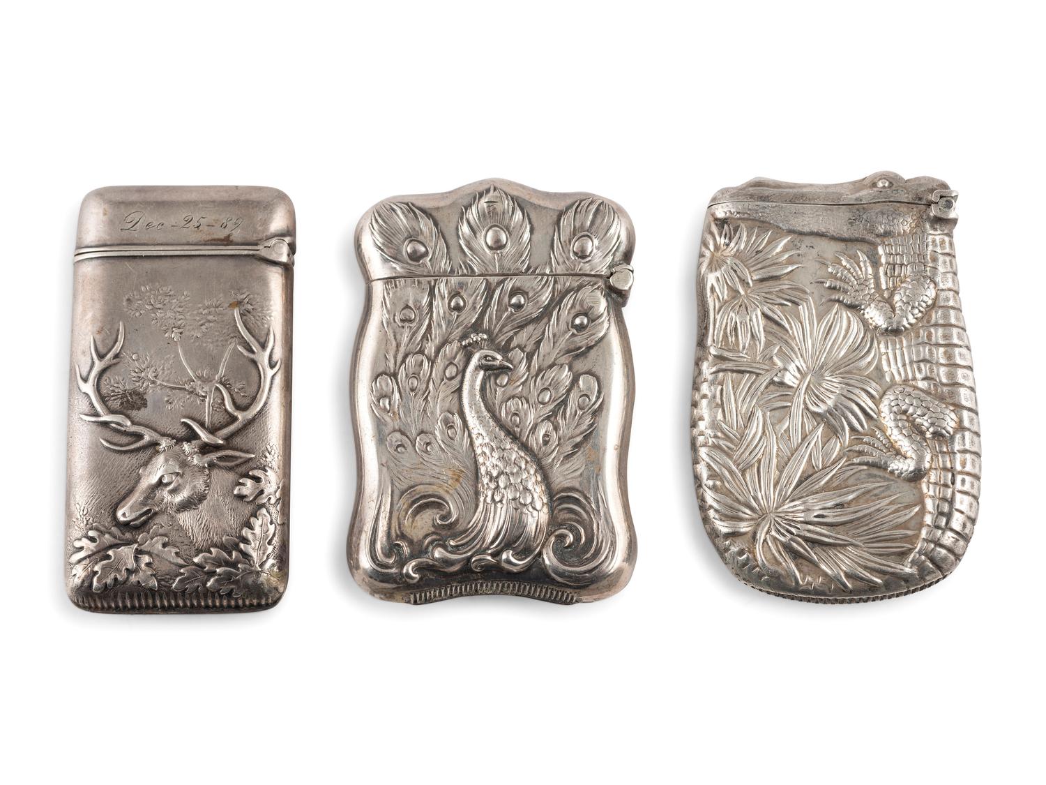 Three Silver Match Safes with Alligator, Peacock and Stag Motifs