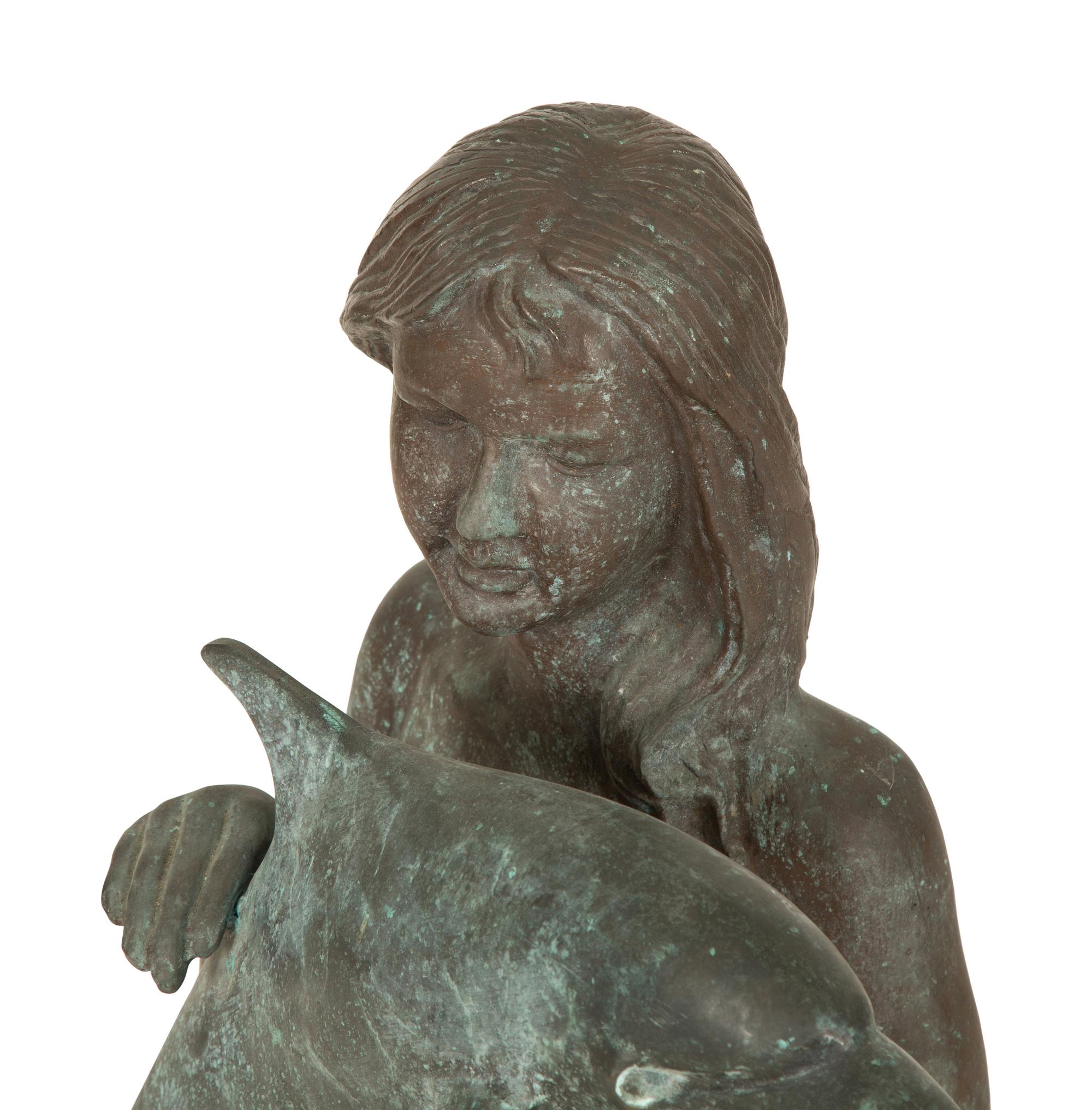 A Chinese Bronze Sculpture of a Mermaid with Dolphin