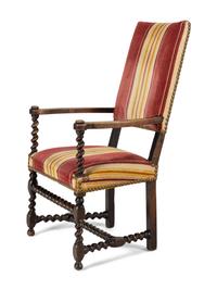 A William and Mary Style Carved Walnut Armchair