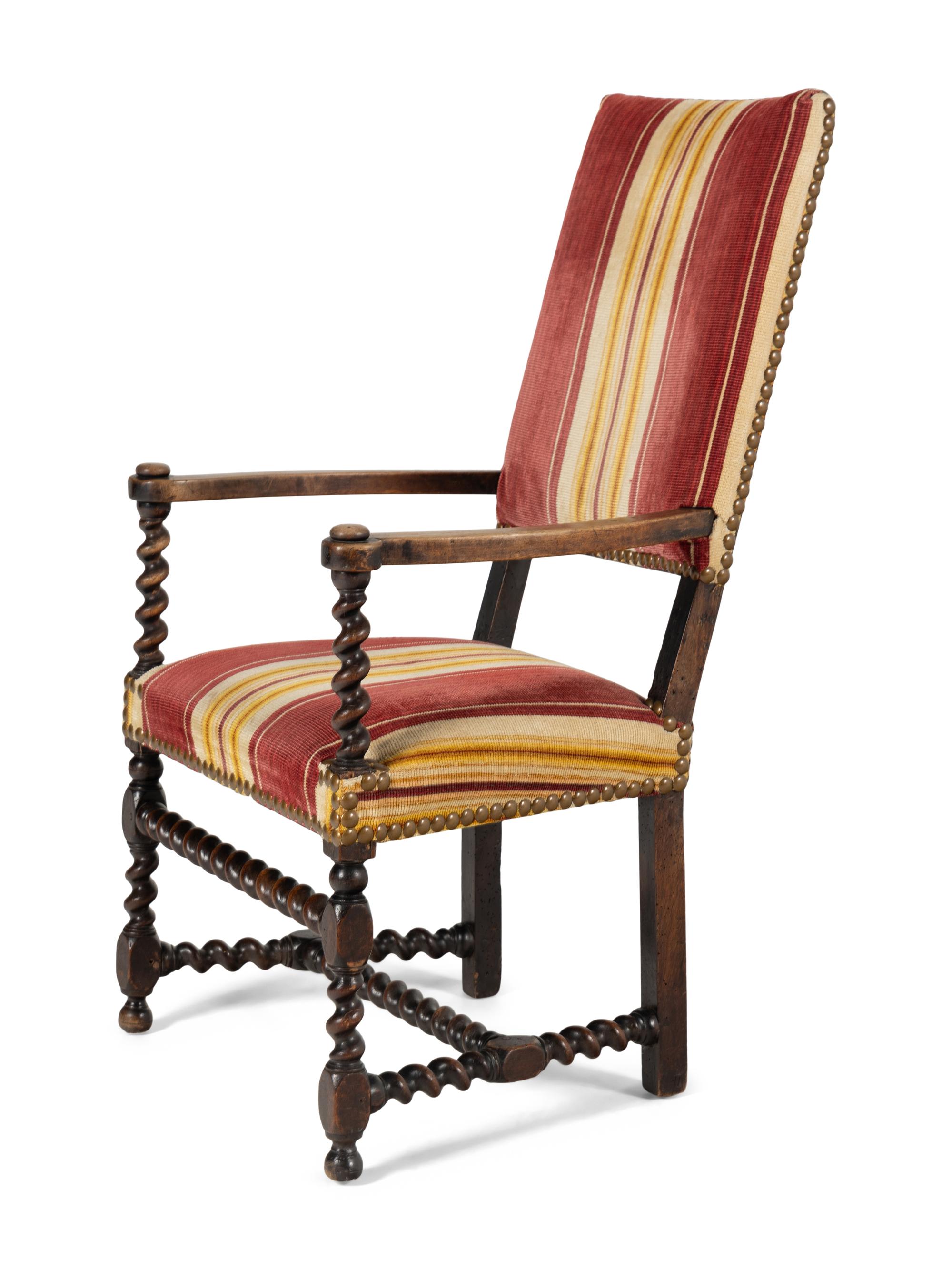 A William and Mary Style Carved Walnut Armchair