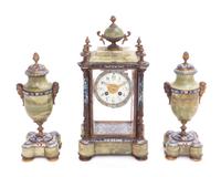 A French Gilt Bronze, Onyx and Champleve Clock Garniture Height of mantel clock 16 inches. — LATE 19TH CENTURY