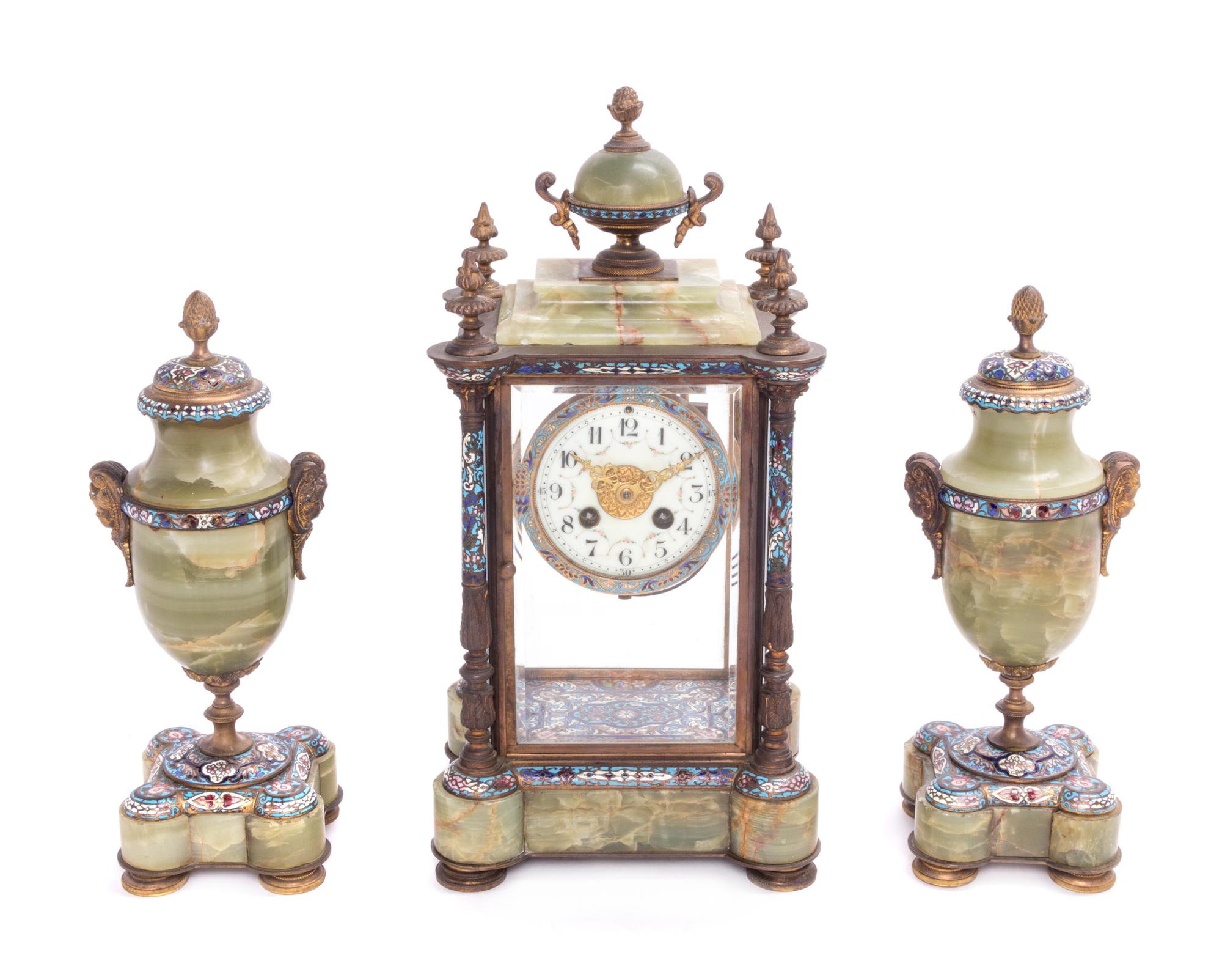 A French Gilt Bronze, Onyx and Champleve Clock Garniture Height of mantel clock 16 inches. — LATE 19TH CENTURY