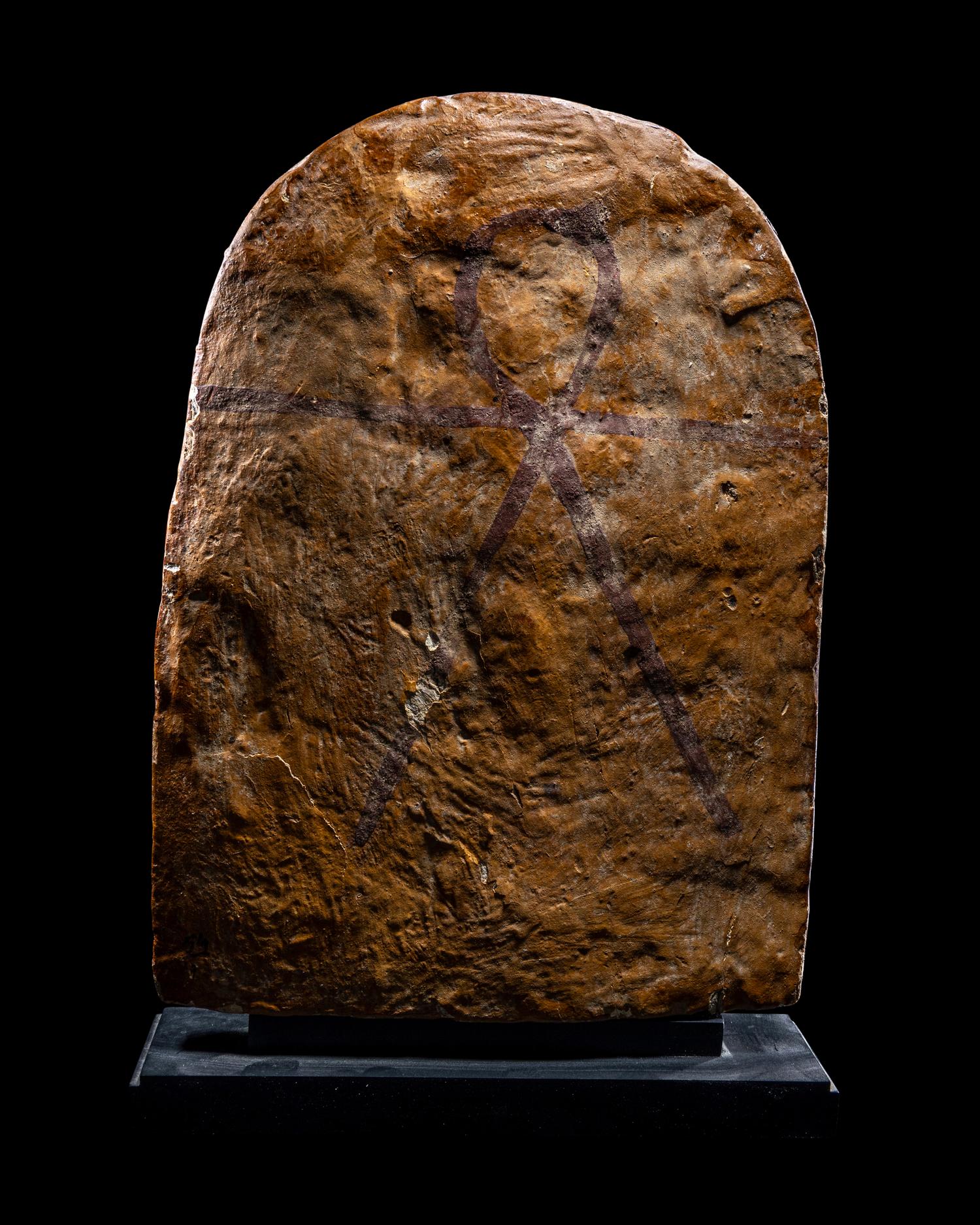 An Egyptian Painted Wood Round-Top Stele