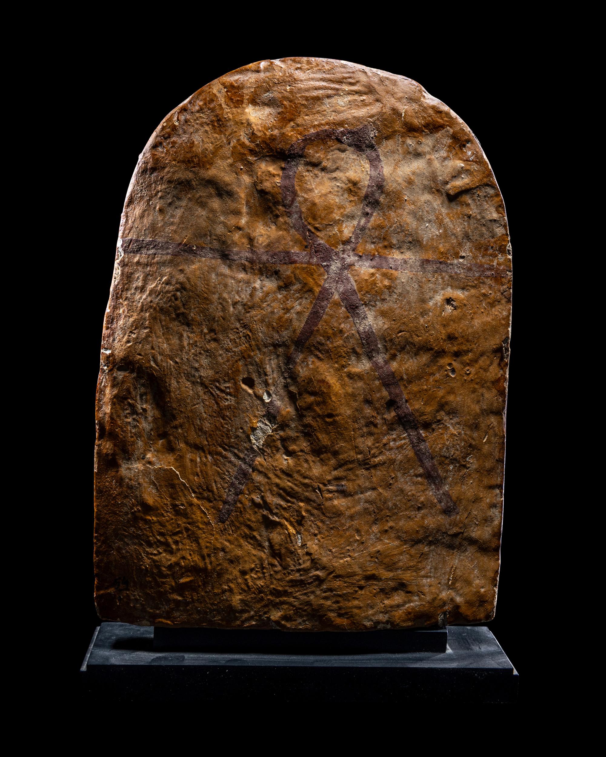 An Egyptian Painted Wood Round-Top Stele