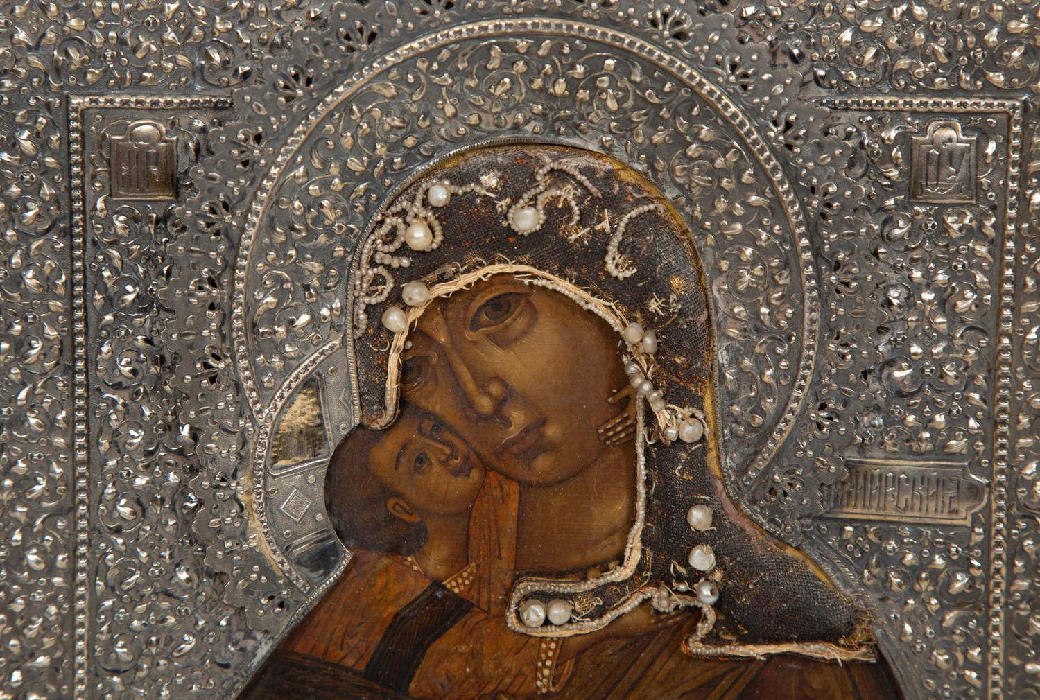 A Russian Silver and Pearl Inset Oklad Icon