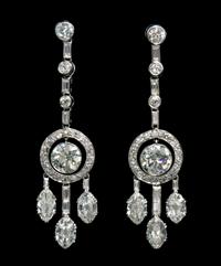 A Pair of Art Deco Platinum and Diamond Dangle Earrings, 7.80 dwts.