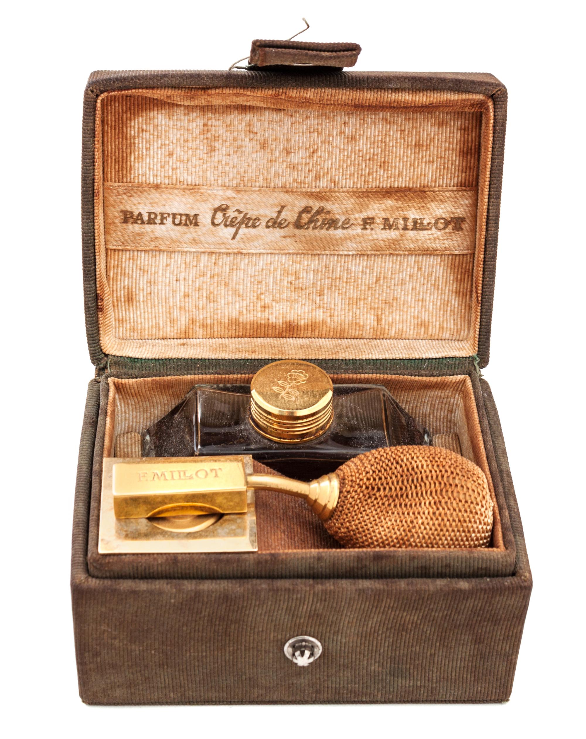 A Millot "Crepe de Chine" Perfume Atomizer Height 2 1/8 inches.