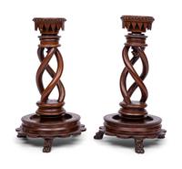 A Pair of Victorian Carved Walnut Candlesticks