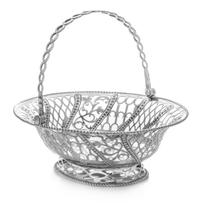 A George III Silver Basket, Chas. Aldridge & Henry Green, London, 1770, the swiveling double-helix handle above the openwork body worke