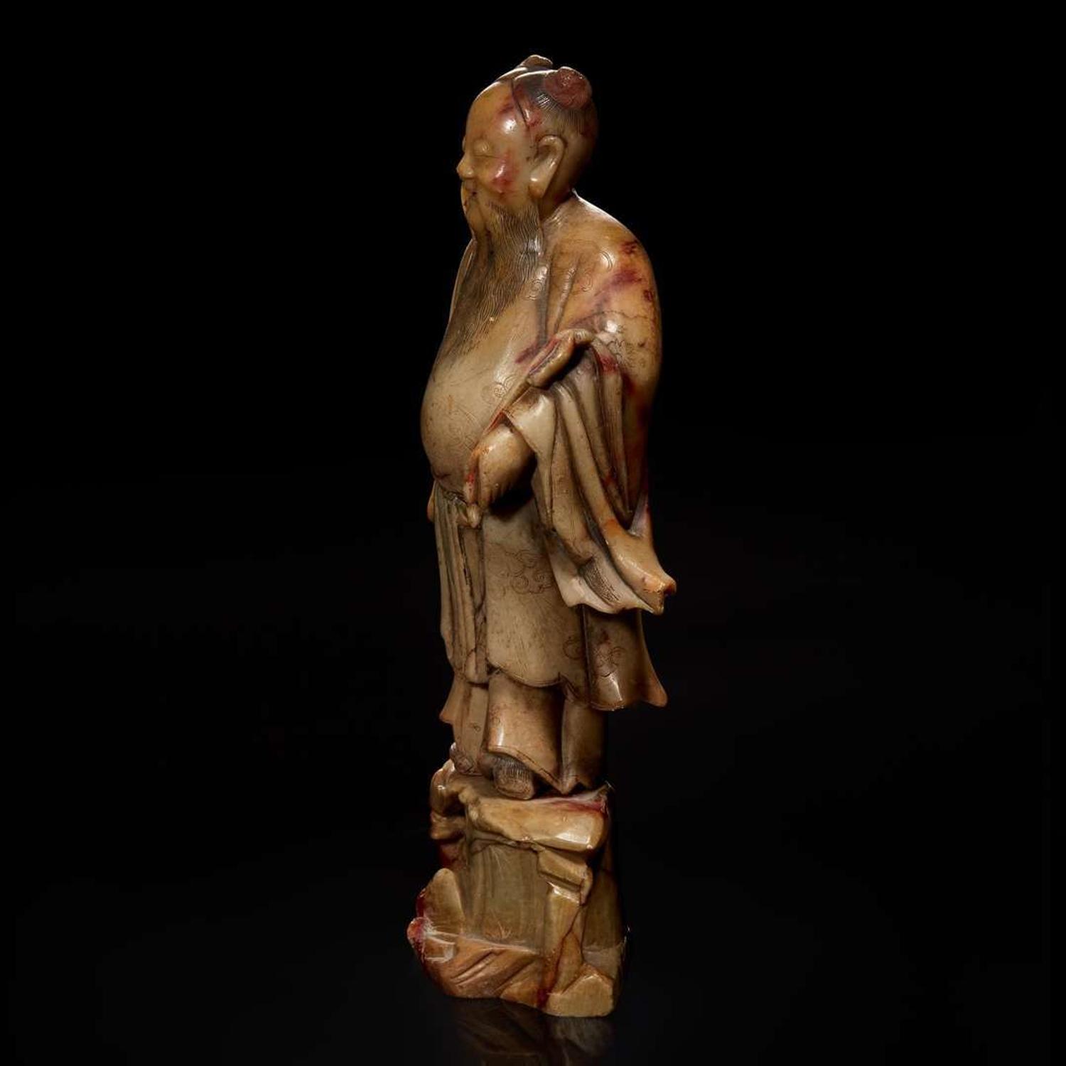 A Chinese carved beige soapstone figure of the Daoist immortal Zhongli Quan 壽山石雕鐘離權 Qing dynasty ?