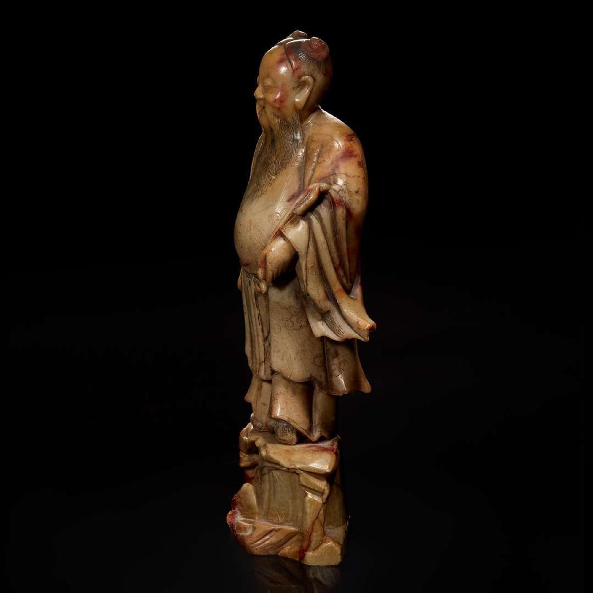 A Chinese carved beige soapstone figure of the Daoist immortal Zhongli Quan 壽山石雕鐘離權 Qing dynasty ?