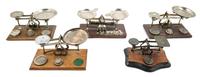 A Group of Four Nickel-Plated Balance Scales Width of widest 9 inches.