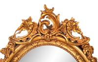 A Rococo Style Giltwood Mirror