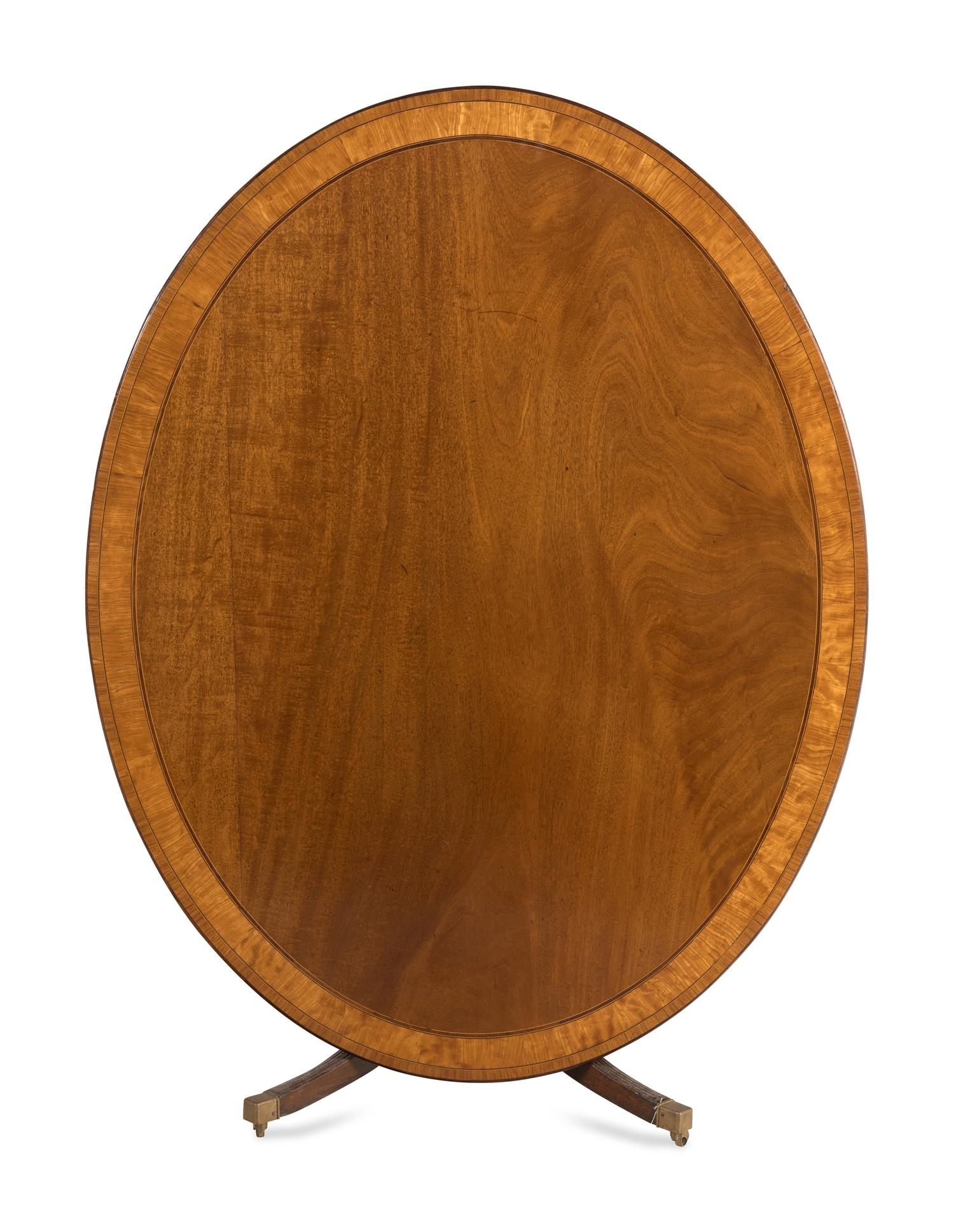 A Regency Mahogany and Satinwood Tilt-Top Breakfast Table