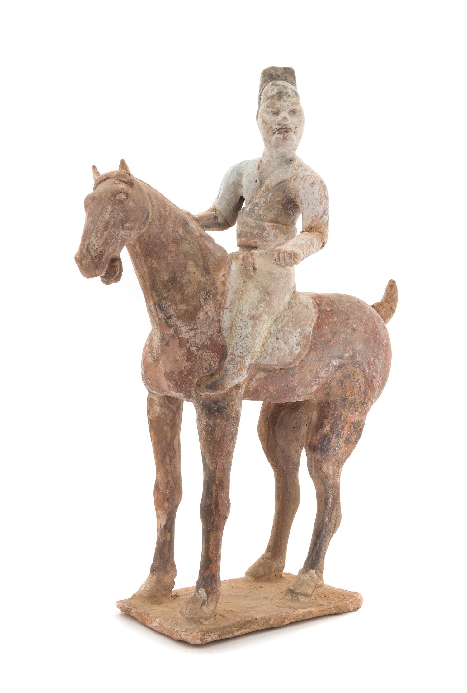 A Painted Pottery Equestrian Figure — TANG DYNASTY