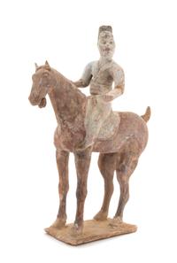 A Painted Pottery Equestrian Figure — TANG DYNASTY
