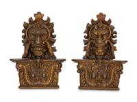 A Pair of Venetian Carved Wood Mask Wall Appliqués