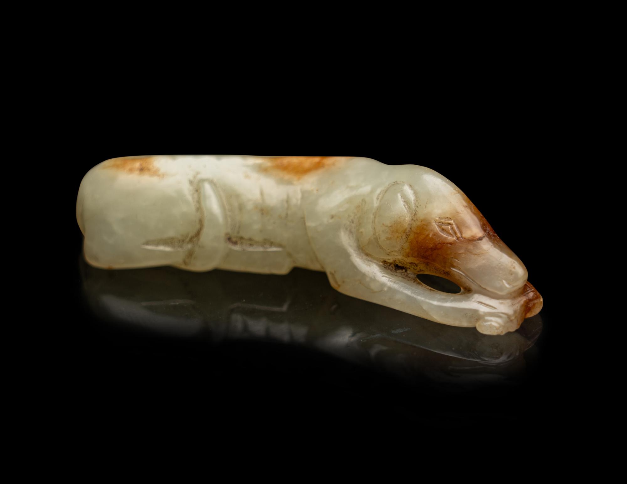 A Chinese Russet and Pale Celadon Green Jade Figure of a Hound