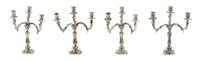 Four Silver Three-Light Candelabra, Harry Smith, Perrysville, IN, each having a baluster form standard issuing foliate candle arms.