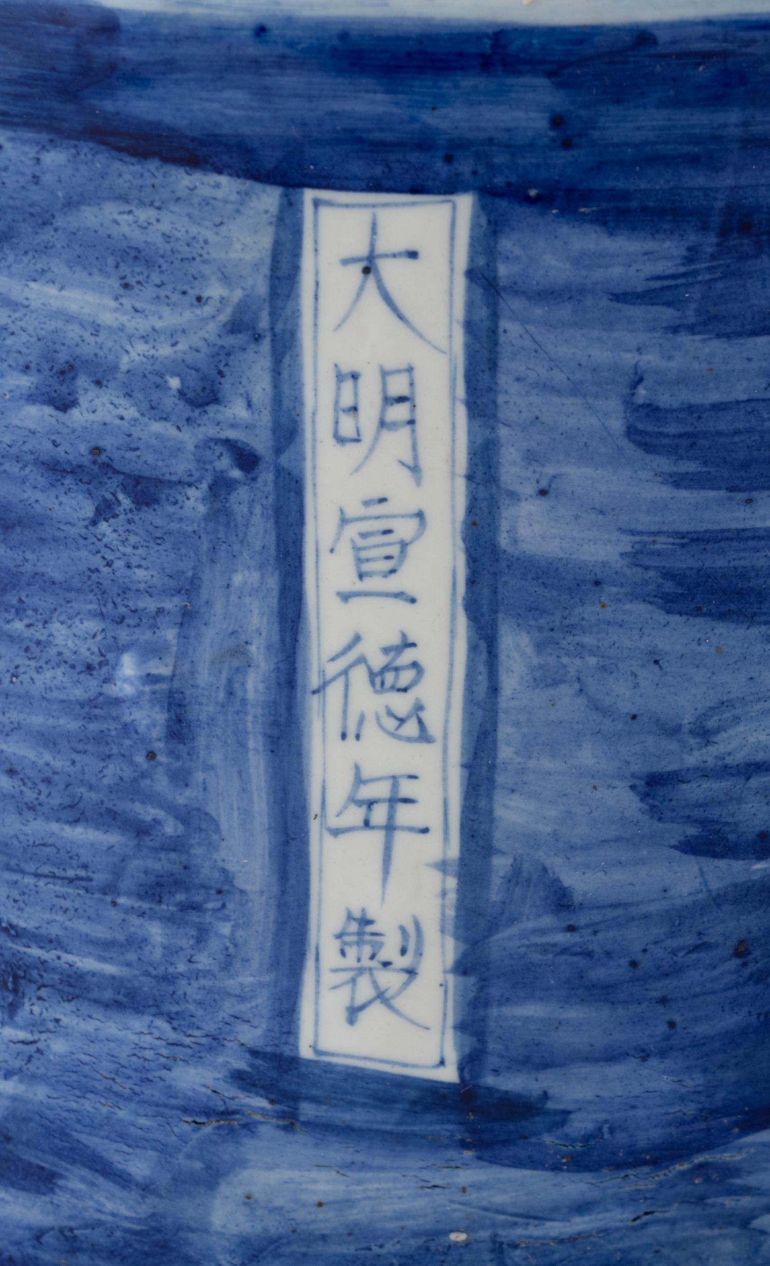 Two Blue and White Glazed Seated Figures