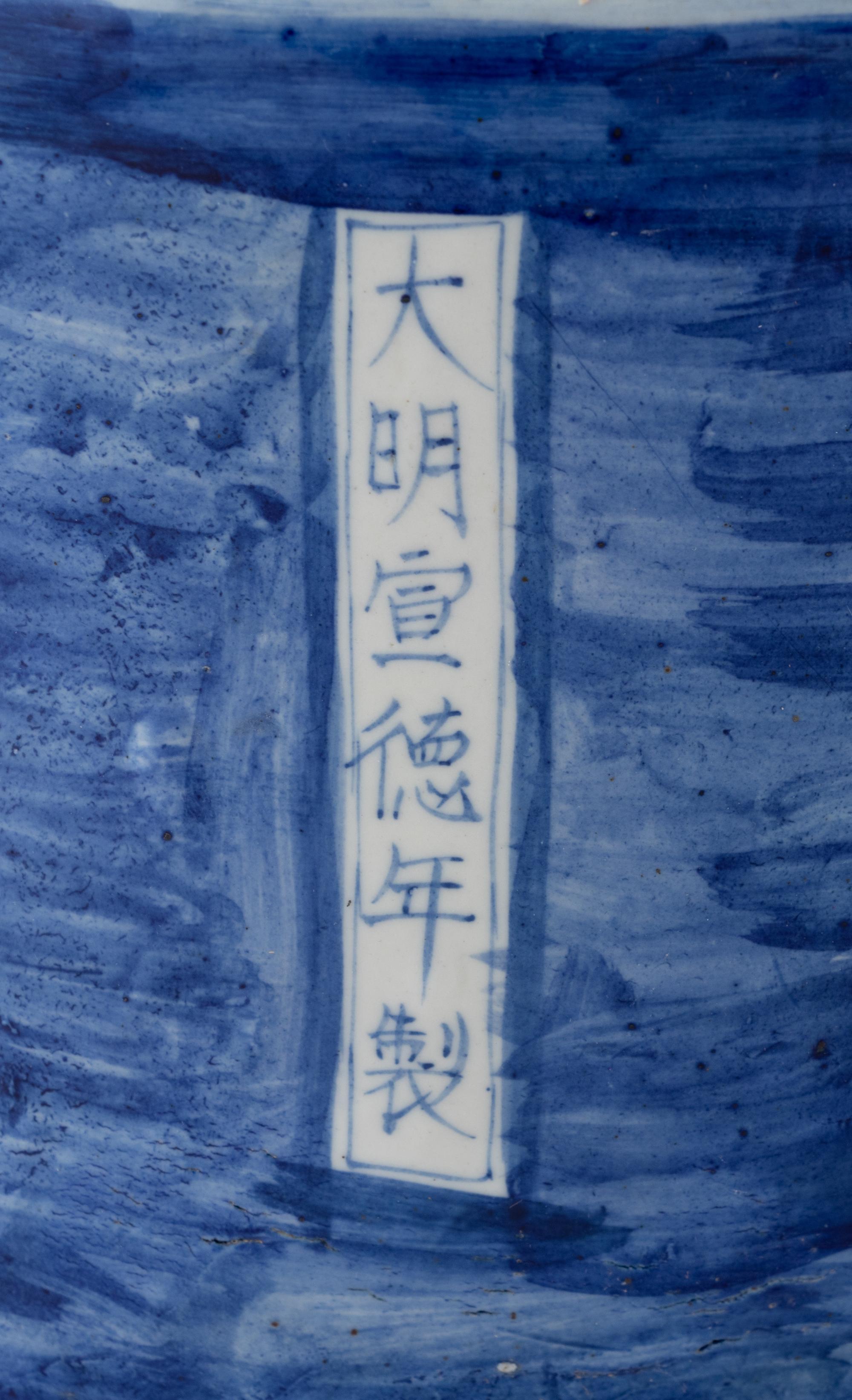 Two Blue and White Glazed Seated Figures