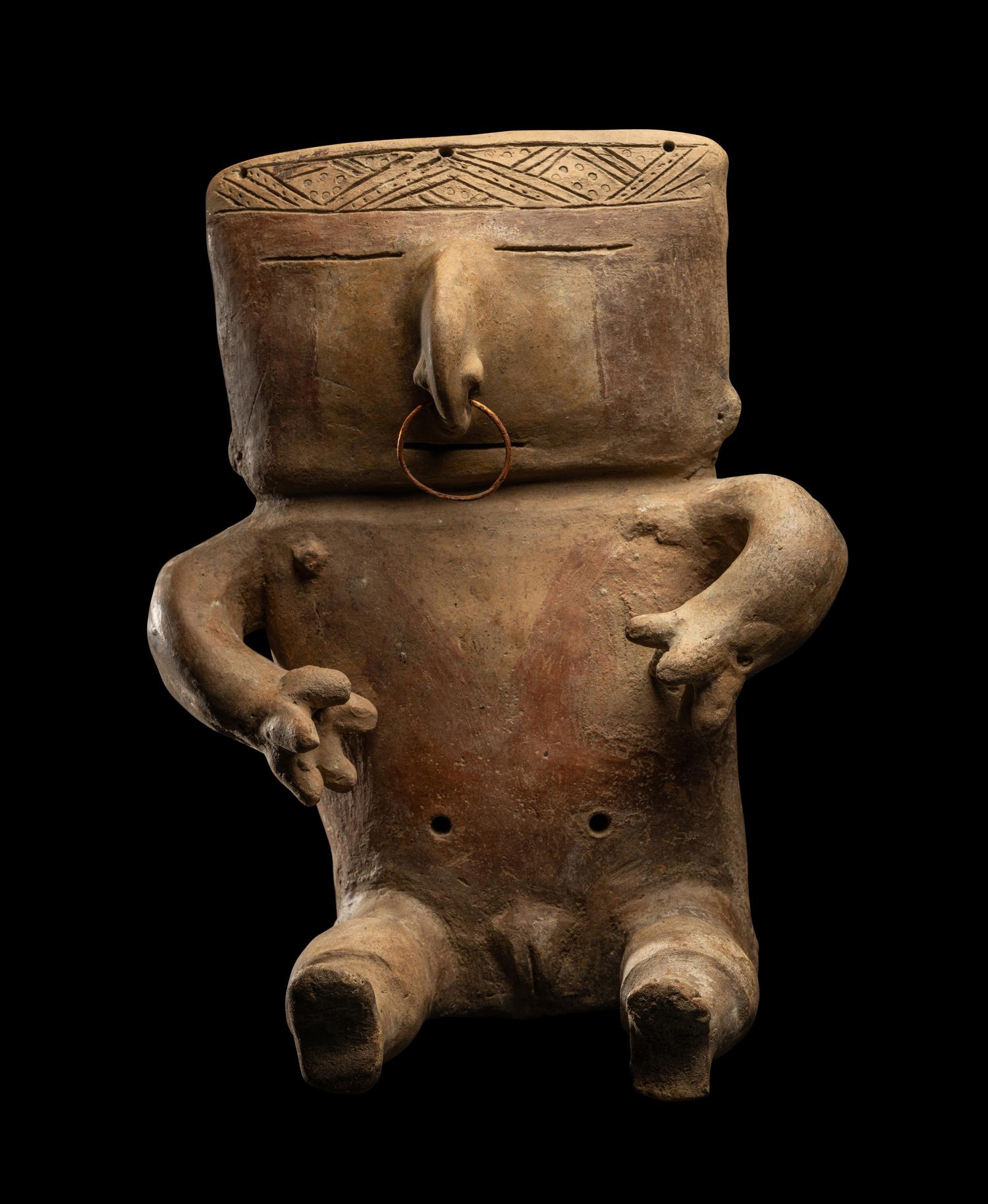A Quimbaya Terracotta Seated Figure