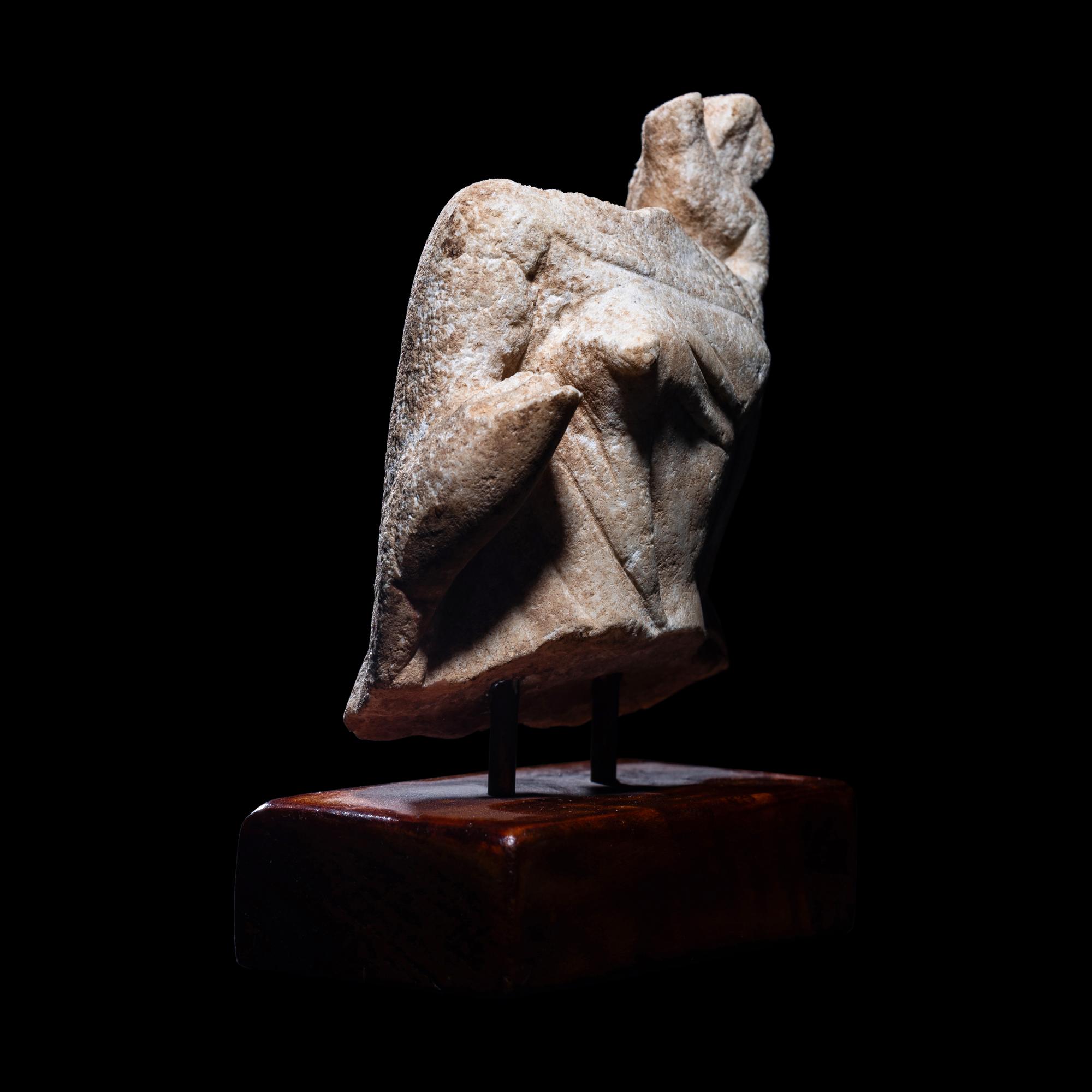 A Roman Marble Fragment of Venus with Eros