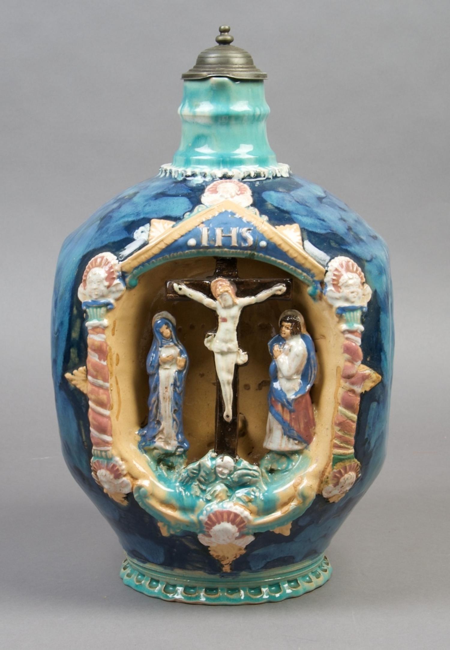A German Ceramic Wine Pitcher, Height 13 3/4 inches.