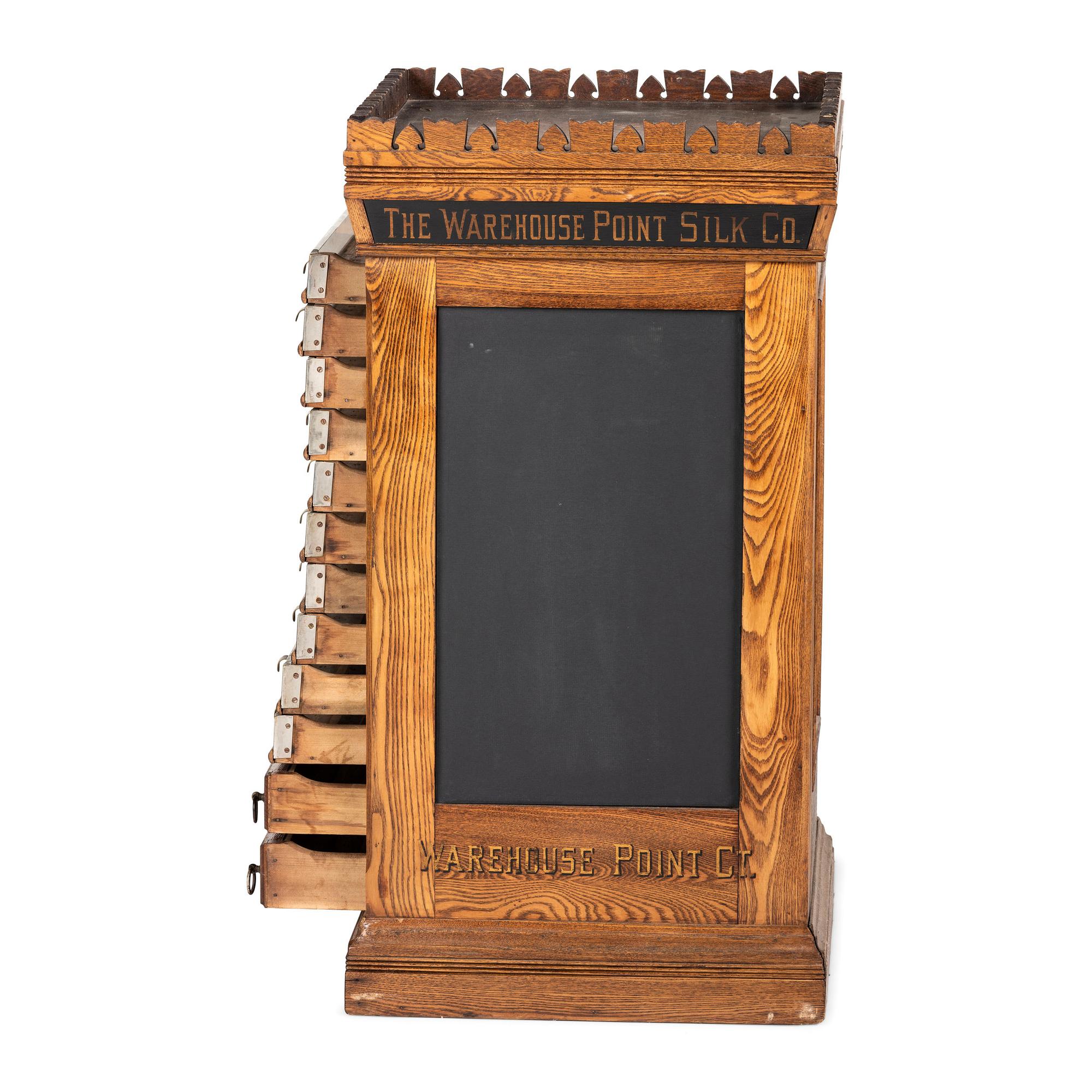 A Warehouse Point Silk Co. Stenciled Spool Cabinet