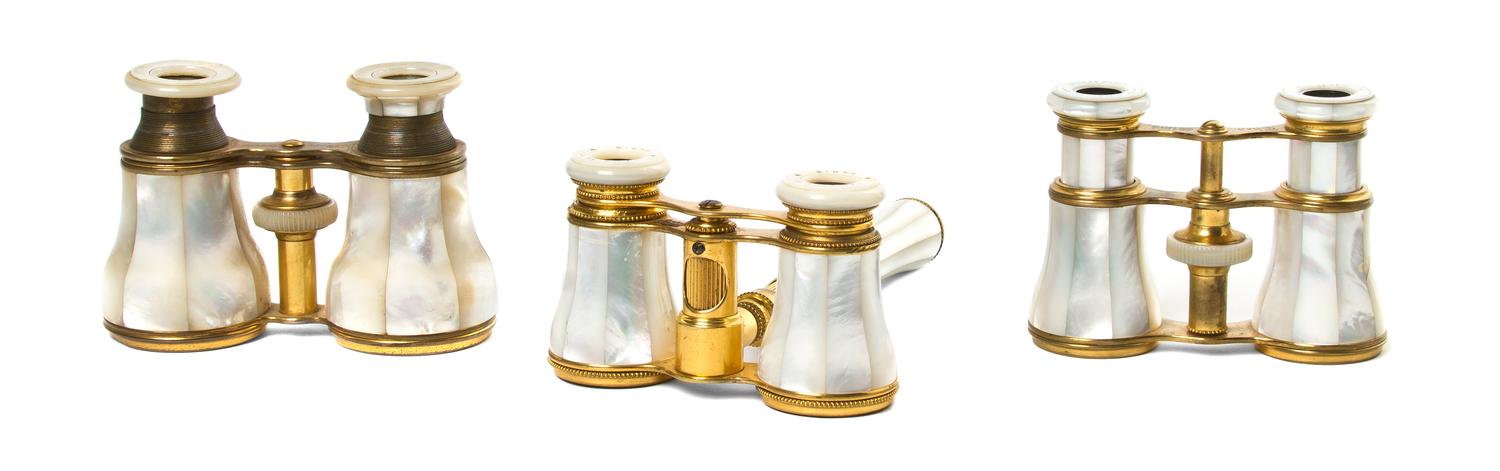 Three Pairs of French Mother-of-Pearl Opera Glasses, Width of widest 4 1/4 inches.