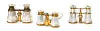 Three Pairs of French Mother-of-Pearl Opera Glasses, Width of widest 4 1/4 inches.