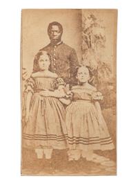 [SLAVERY & ABOLITION]. CDV of Robert Whitehead with white slave children Rebecca and Rosa of New Orleans. New London, CT: Morgan & Bolles, ca 1863-1864.