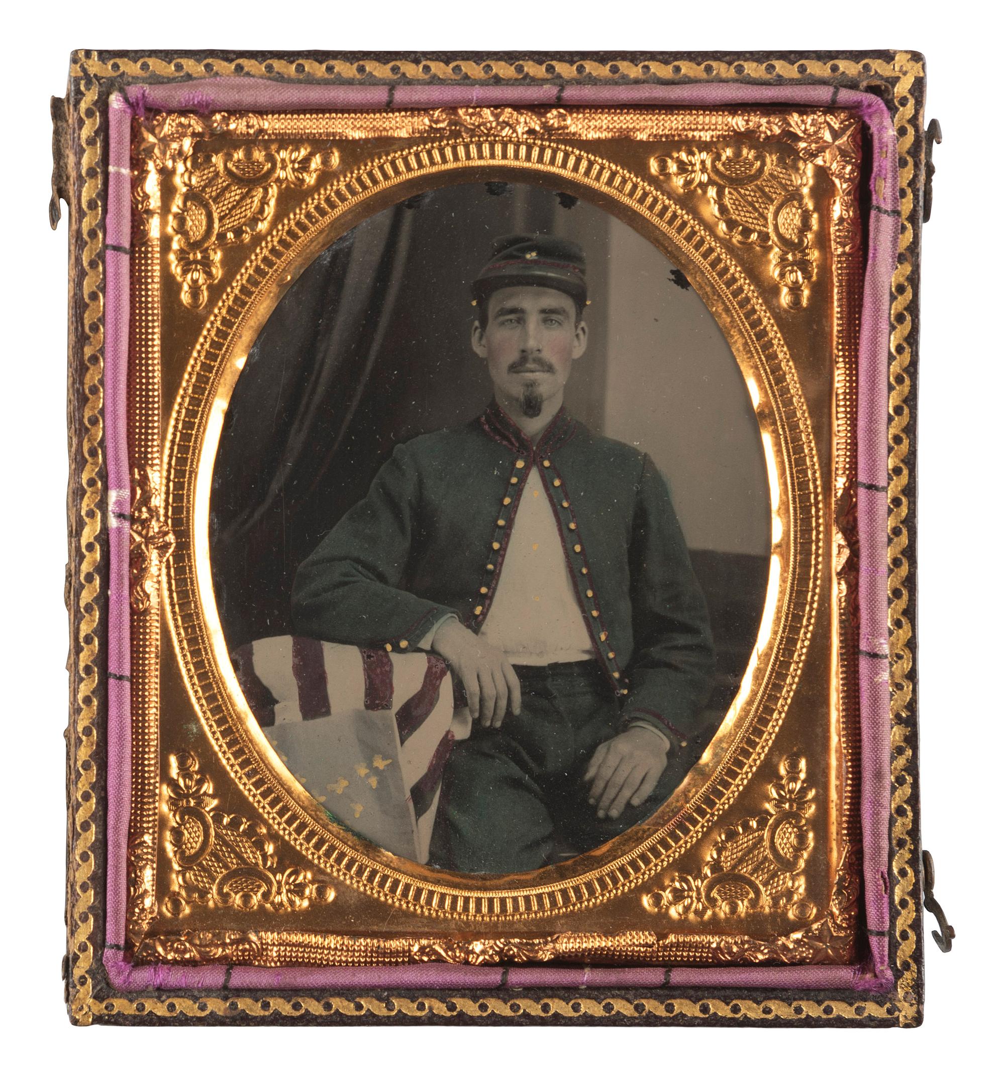 [CIVIL WAR]. Sixth plate ruby ambrotype of a Baxter's Fire Zouave, 72nd Pennsylvania Infantry.