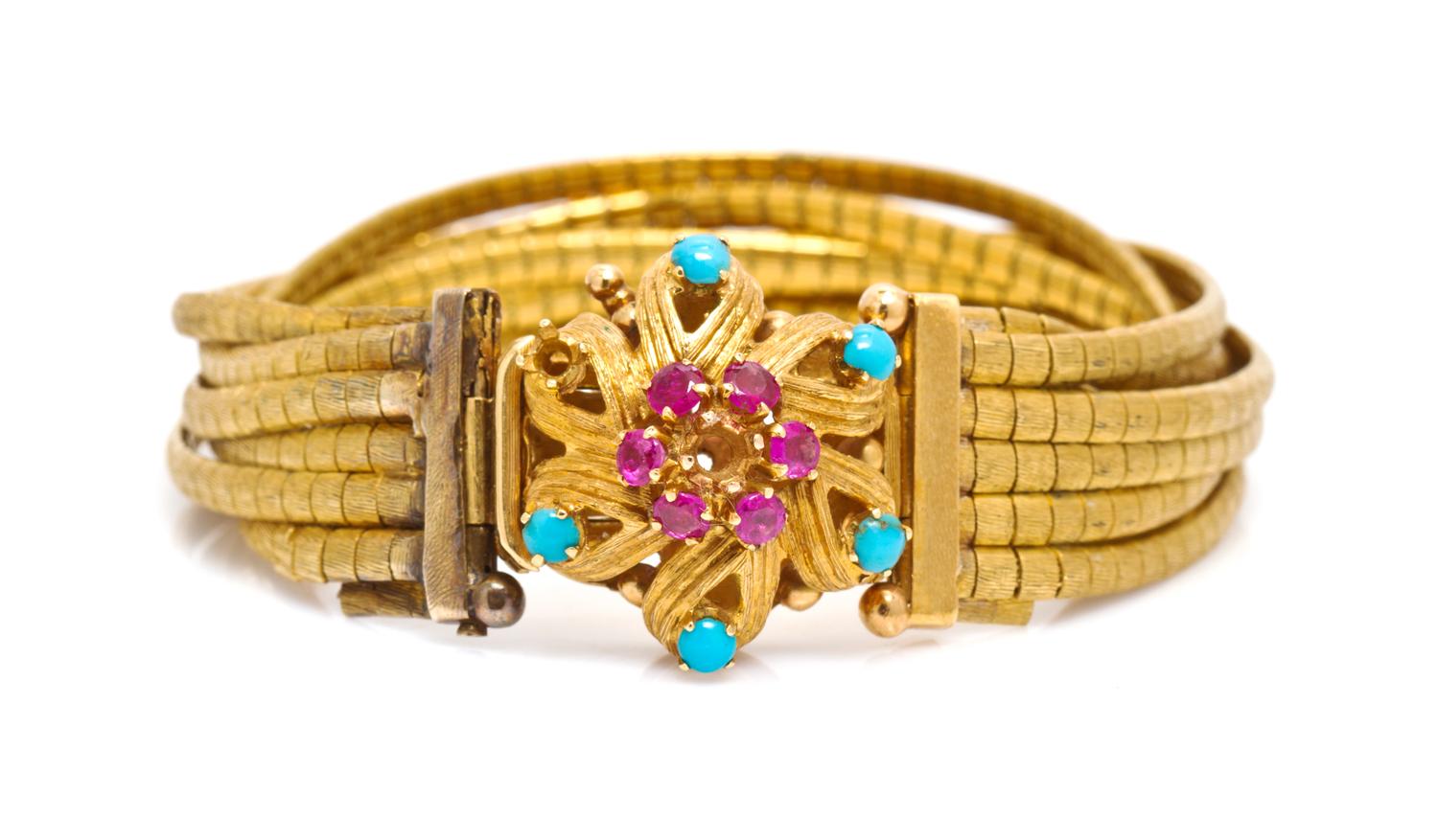 An 18 Karat Yellow Gold, Turquoise and Ruby Multi-Strand Bracelet, Italian, 40.60 dwts.