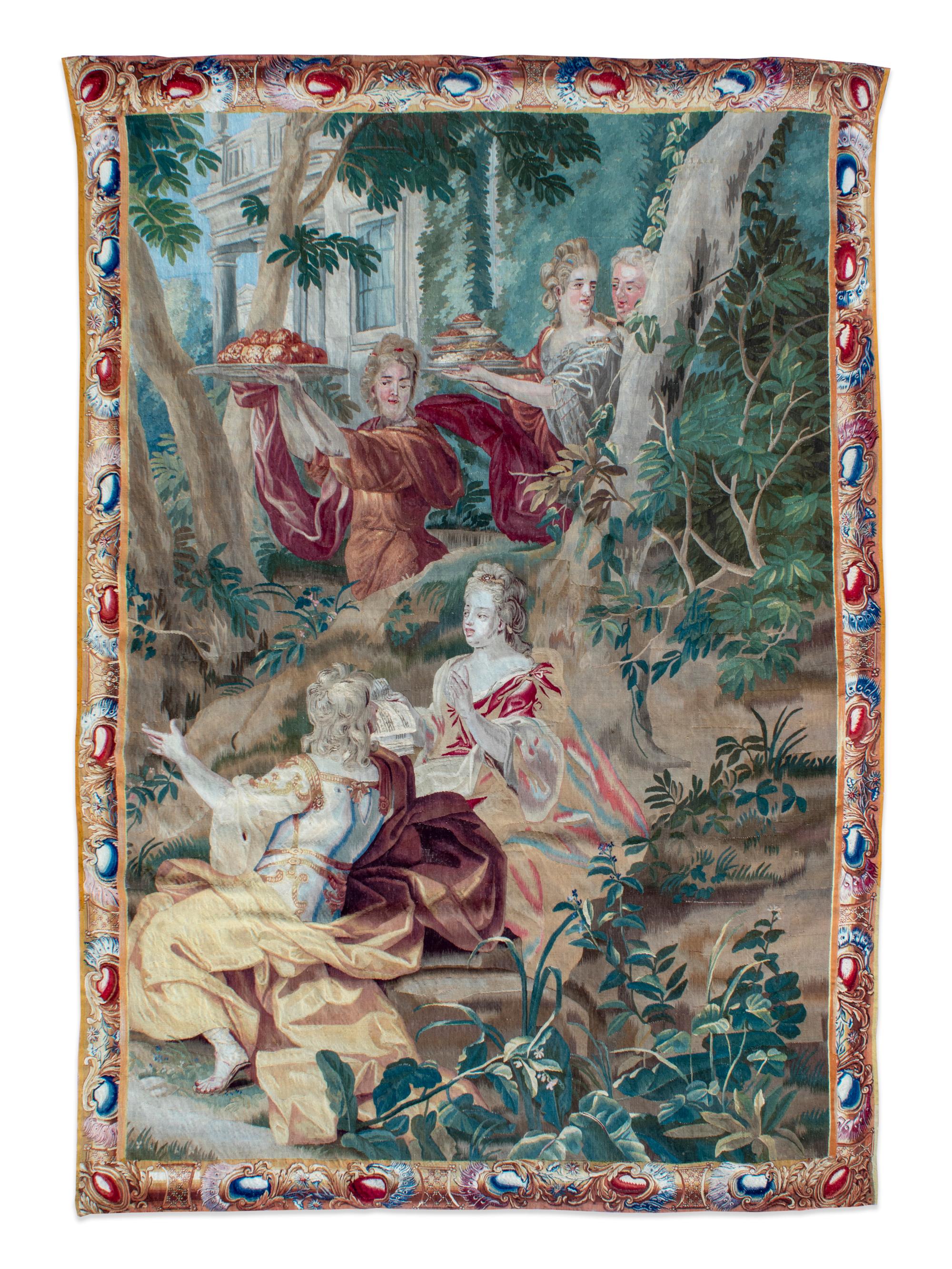 A Brussels Silk and Wool Tapestry Depicting Le Plaisir du Goûter — CIRCA 1700