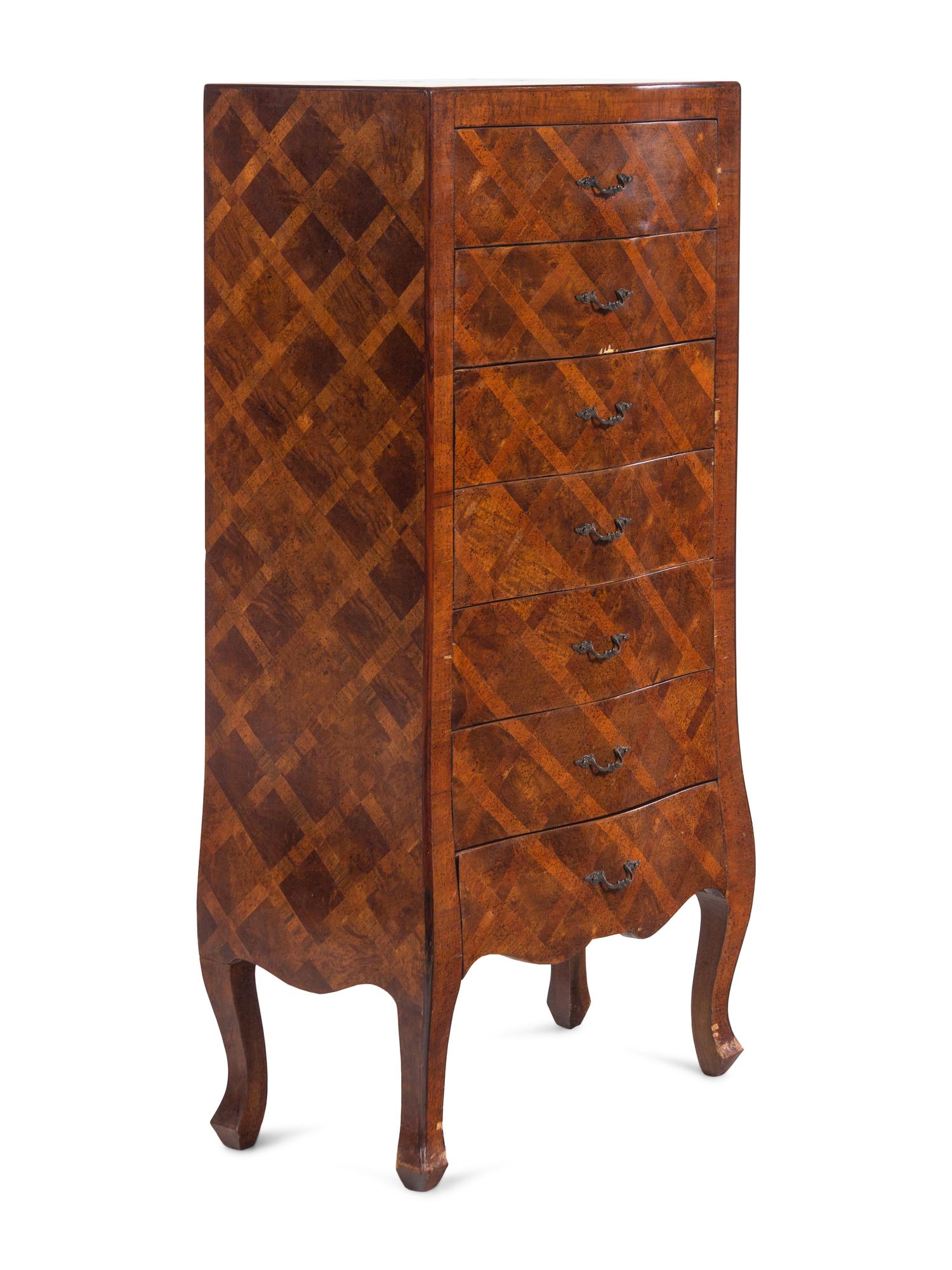 An Italian Walnut and Parquetry Chest of Drawers