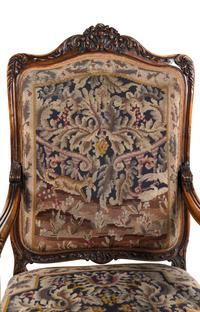 A Pair Louis XV Style Carved Walnut Fauteuils