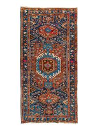 A Mousel Wool Rug — 20TH CENTURY