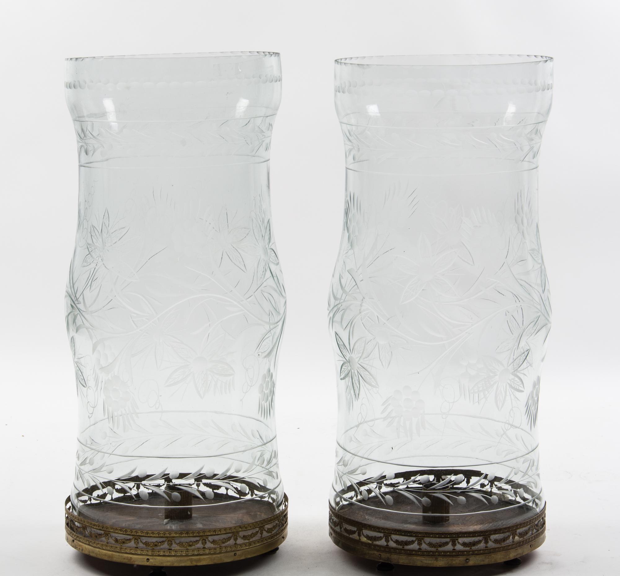 A Pair of Large Etched Glass Hurricanes Height 21 inches.