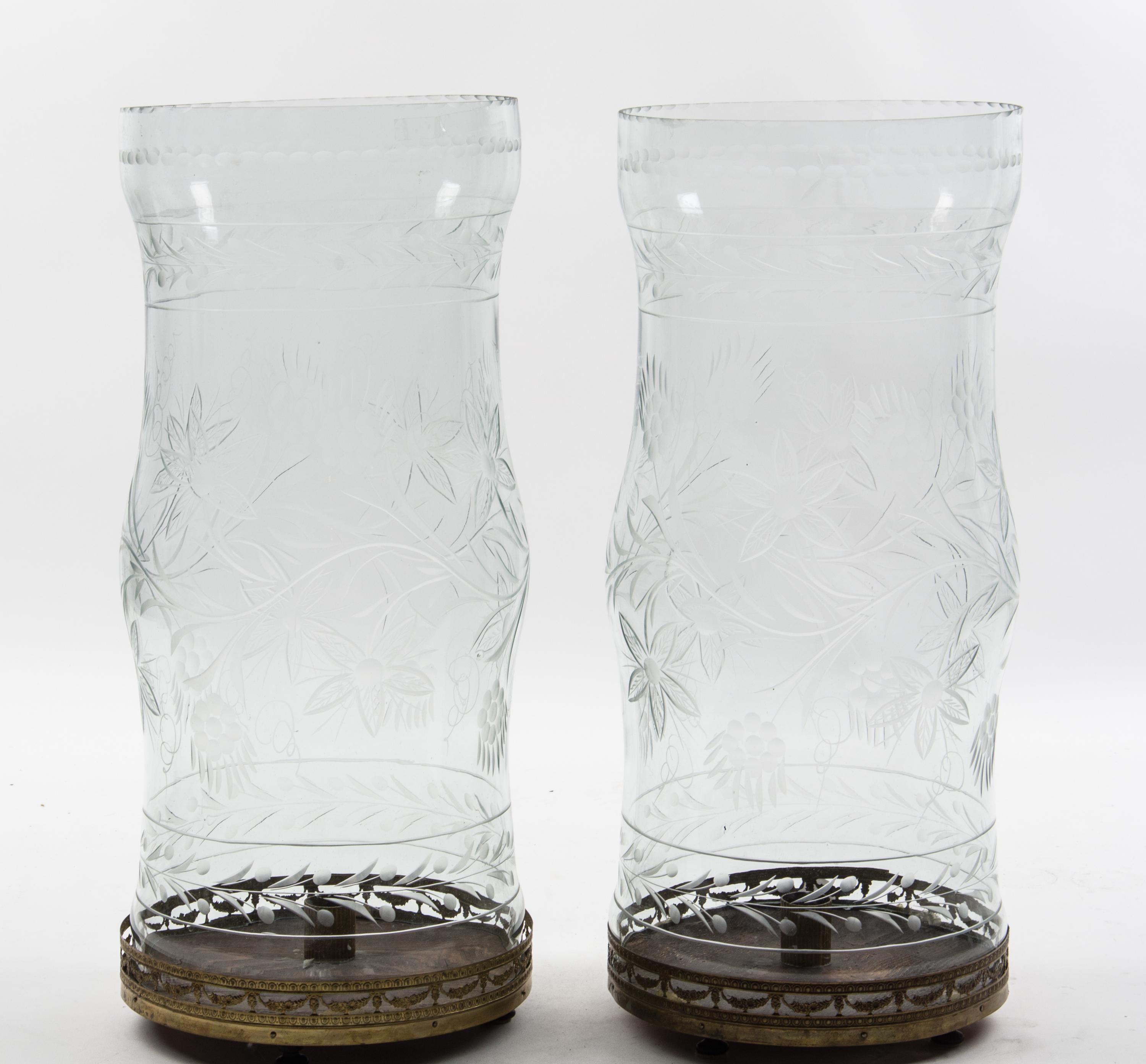 A Pair of Large Etched Glass Hurricanes Height 21 inches.