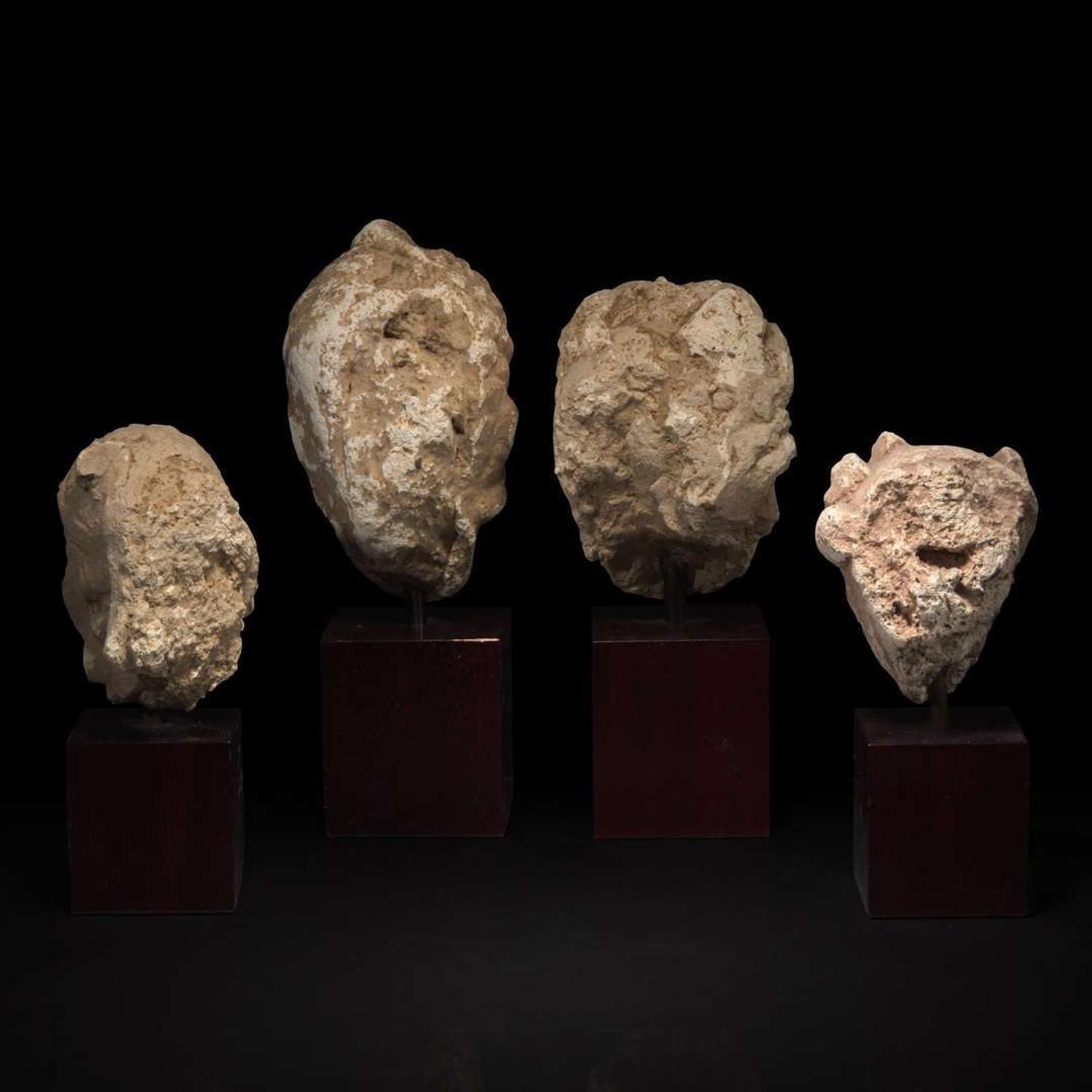 A group of four small stucco heads 石灰岩佛首一组四件 Gandhara, 4rd-5th Century ??? ?????