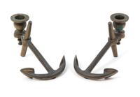 A Pair of Brass Anchor-Form Candlesticks Height of hurricane shades 14 1/4 inches. — 20TH CENTURY
