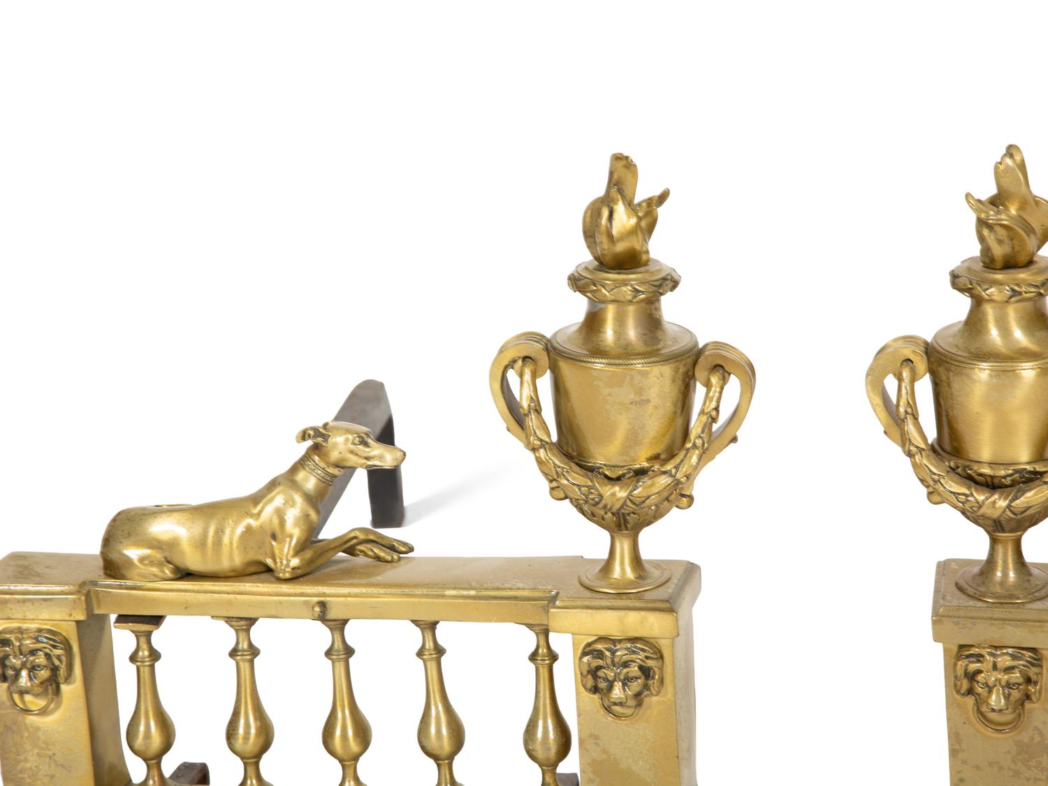 A Pair of French Brass Chenets with Recumbent Dogs