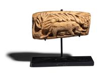 A Coptic Bone Fragment with a Lion Hunting Scene