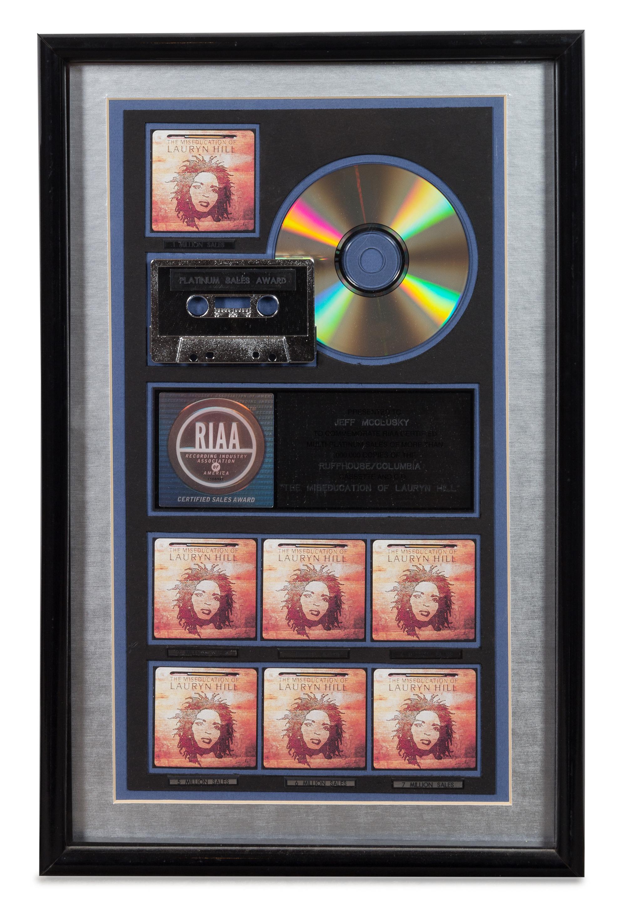 A Lauryn Hill: The Miseducation of Lauryn Hill RIAA Certified 7x Platinum Presentation Album 20 x 12 3/4 inches.