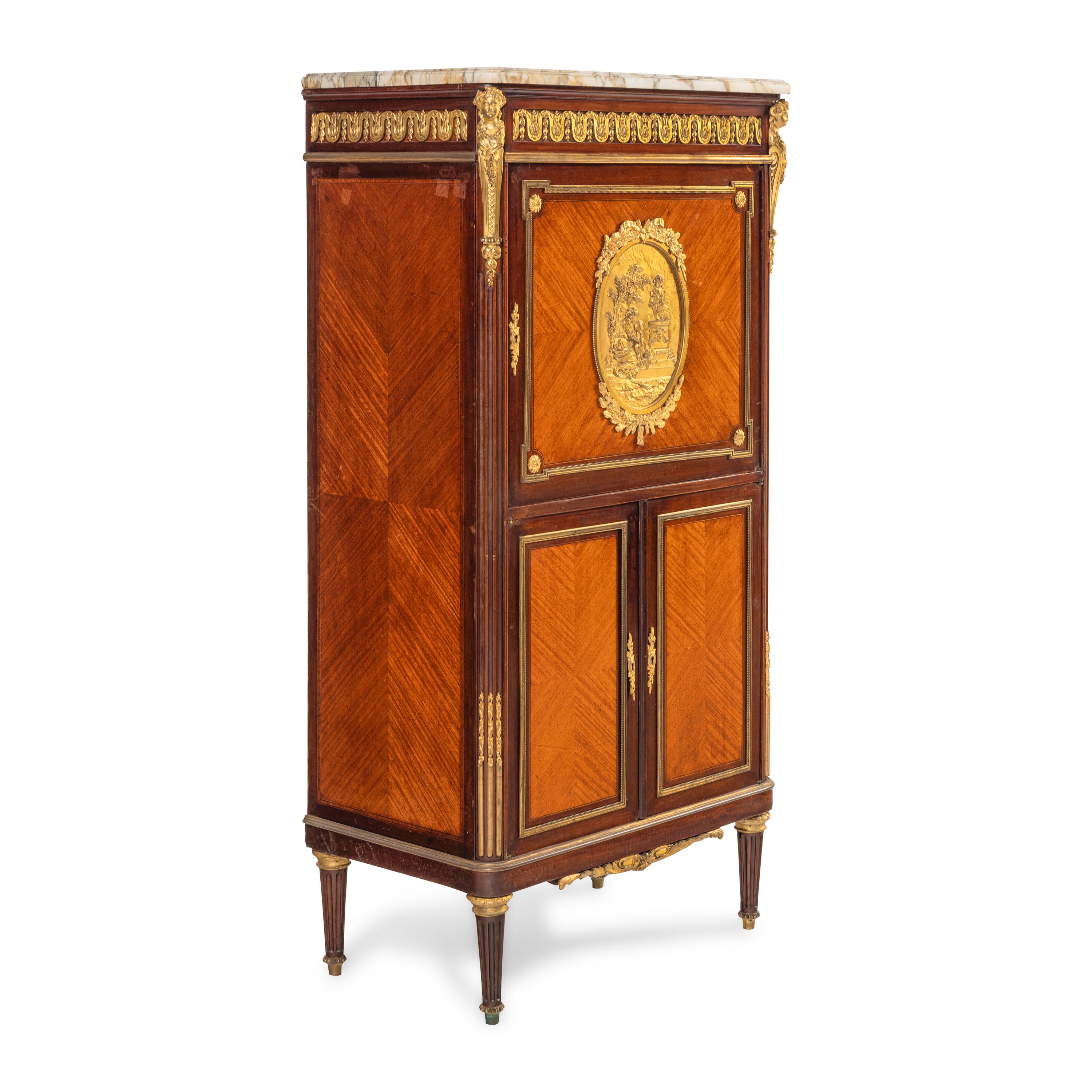 A Louis XV Style Gilt Bronze Mounted Mahogany and Tulipwood Marble-Top Cabinet