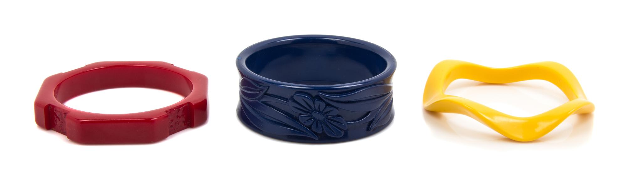 A Group of Blue, Red and Yellow Bakelite Bangles,