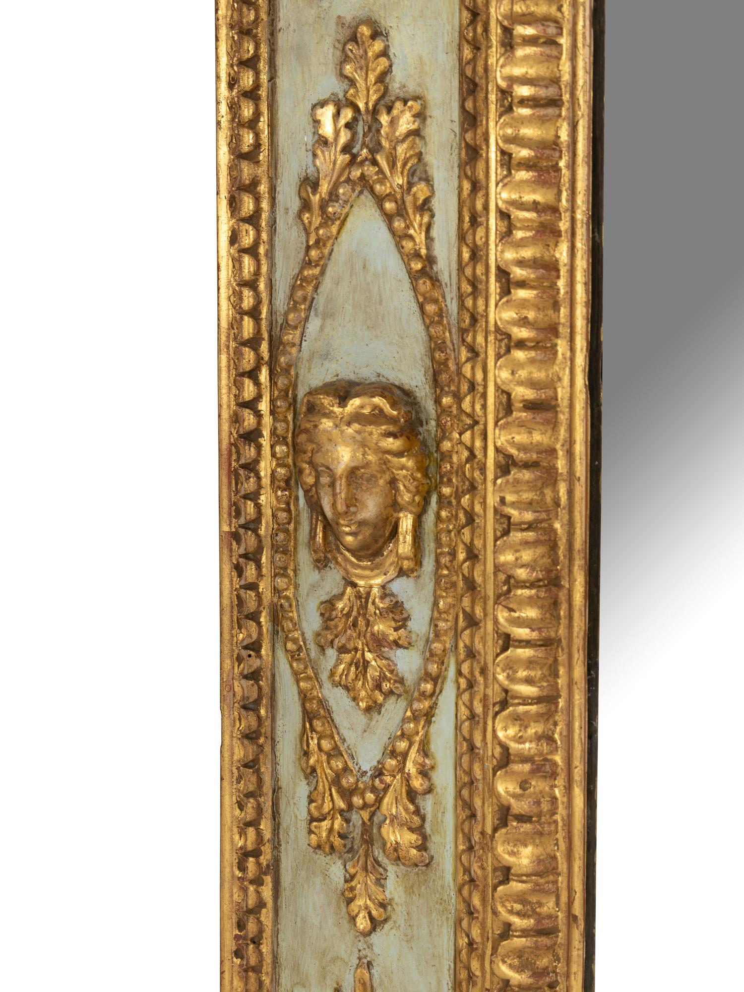 An Italian Neoclassical Painted and Parcel Gilt Mirror
