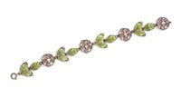 An Art Nouveau Silver, Plique-à-jour Enamel and Seed Pearl Bracelet, 10.80 dwts.