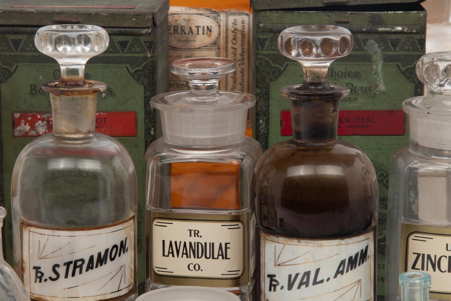 A Collection of Glass Apothecary Bottles